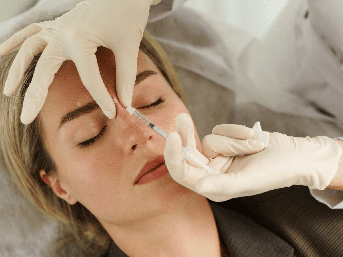 a girl getting face injections